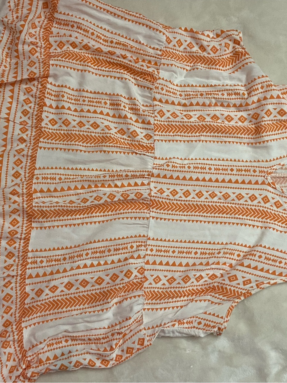 Unique Spectrum Orange & White Aztec-Print top